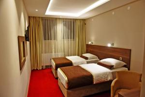 Hotel Bavka房間的床