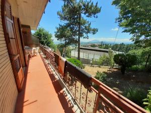a balcony of a house with a view of the water at Casetta Appennina (Bike Host) in Montefalcone Appennino