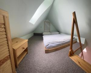 Postel nebo postele na pokoji v ubytování Nad Strumykiem 2