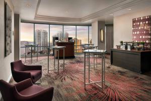 a hotel bar with a view of a city at Las Vegas Marriott in Las Vegas