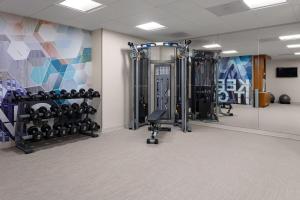 a fitness room with a gym with equipment at SpringHill Suites by Marriott Beaufort in Beaufort