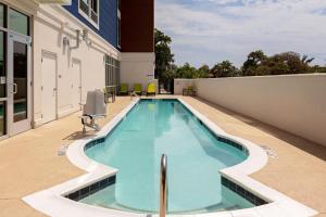 a swimming pool on the roof of a building at SpringHill Suites by Marriott Beaufort in Beaufort