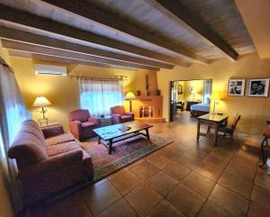 a living room with a couch and a table at Hacienda del Sol Guest Ranch Resort in Tucson