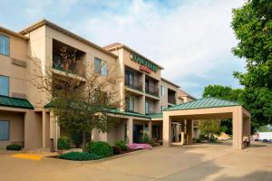 a rendering of the front of a hotel at Courtyard by Marriott Champaign in Champaign
