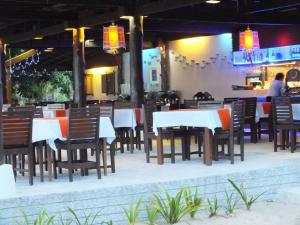 A restaurant or other place to eat at C&N Kho Khao Beach Resort - SHA Plus