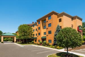 a rendering of a hotel with a parking lot at Courtyard by Marriott Danbury in Danbury