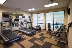 a gym with treadmills and cardio equipment in a building at Courtyard by Marriott Winchester Medical Center in Winchester