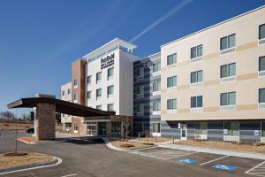 a rendering of the front of a hotel with a parking lot at Fairfield Inn & Suites by Marriott Fayetteville in Fayetteville