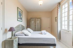 Posteľ alebo postele v izbe v ubytovaní Villa Proust - Welkeys