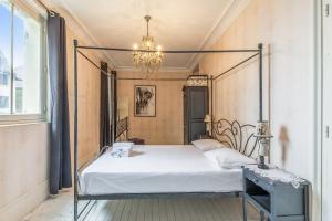 Posteľ alebo postele v izbe v ubytovaní Villa Proust - Welkeys