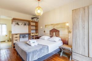Posteľ alebo postele v izbe v ubytovaní Villa Proust - Welkeys