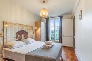 Posteľ alebo postele v izbe v ubytovaní Villa Proust - Welkeys