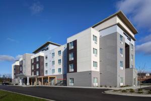 a rendering of the front of a building at TownePlace Suites by Marriott Grand Rapids Airport in Grand Rapids