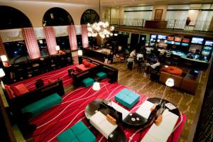 an aerial view of a hotel lobby with a room at Courtyard Toluca Airport in Toluca