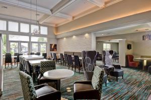 a dining room with tables and chairs and tablesktop at Residence Inn Los Angeles LAX/El Segundo in El Segundo