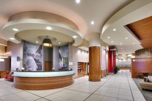 a lobby of a hospital with a waiting area at SpringHill Suites by Marriott Las Vegas Convention Center in Las Vegas