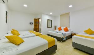 Hotel Grand Caribe客房内的一张或多张床位