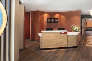 a lobby with a reception desk in a office at TownePlace Suites by Marriott San Diego Downtown in San Diego