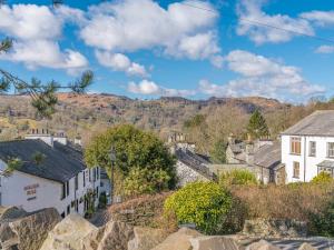 a view of a village with mountains in the background at Prospect Cottage Studio in Ambleside
