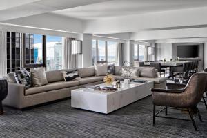 a living room with a couch and a table at New York Marriott Marquis in New York