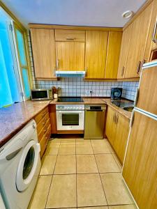 Kuchyň nebo kuchyňský kout v ubytování Ocean breeze