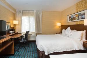 A bed or beds in a room at Fairfield Inn Manchester - Boston Regional Airport