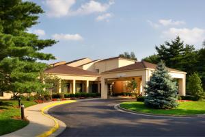 a large house with a winding driveway at Courtyard by Marriott Lexington North in Lexington