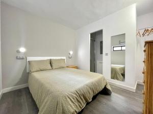 En eller flere senge i et værelse på Seaside Escape in Aguadulce