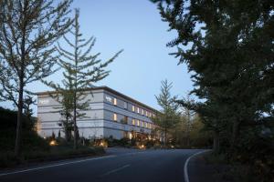 a building on the side of a road at Fairfield by Marriott Hyogo Kannabe Highland in Toyooka