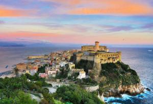 an island in the ocean with a castle at Mare qui in Gaeta