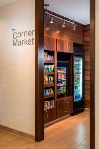 a store entrance with a corner market refrigerator at Fairfield Inn & Suites Lafayette in Lafayette