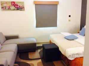 Postel nebo postele na pokoji v ubytování Ne-yo hotel & rv lodges