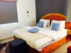 Postel nebo postele na pokoji v ubytování Ne-yo hotel & rv lodges