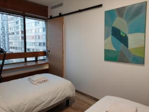 Posteľ alebo postele v izbe v ubytovaní Paris beaugrenelle: charmante résidence