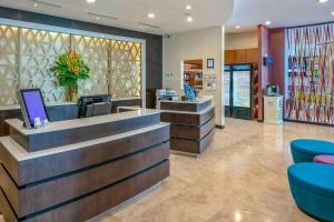 a lobby of a store with a cash register at Residence Inn by Marriott San Jose Escazu in San José