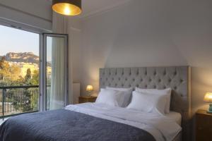 A bed or beds in a room at A Truly WOW Experience for Every Guest. THE place