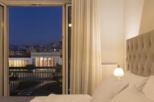A bed or beds in a room at A Truly WOW Experience for Every Guest. THE place