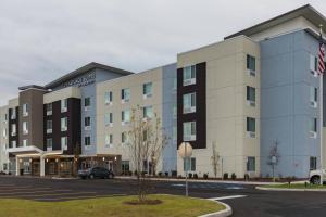 a rendering of the exterior of a hotel at TownePlace Suites by Marriott Syracuse Clay in Liverpool