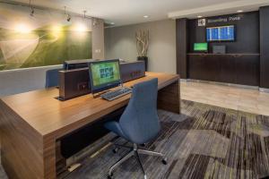 an office with a desk with a computer on it at Courtyard Seattle Southcenter in Tukwila