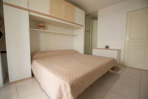 Posteľ alebo postele v izbe v ubytovaní Quiet and cozy 1BR close to beach and all services
