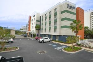 a parking lot in front of a hotel at Fairfield Inn & Suites by Marriott Tampa Westshore/Airport in Tampa