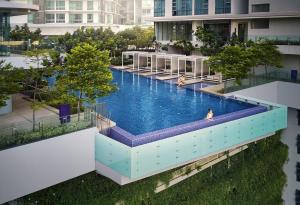 an overhead view of a swimming pool in a building at 3 Bedroom Robertson at Bukit Bintang with Netflix in Kuala Lumpur