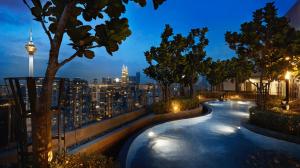 a view of a city skyline at night at 3 Bedroom Robertson at Bukit Bintang with Netflix in Kuala Lumpur