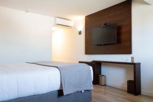 TV a/nebo společenská místnost v ubytování Hotel HW High Wellness
