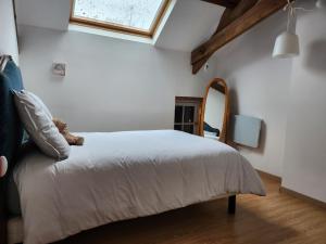 Posteľ alebo postele v izbe v ubytovaní Maison chaleureuse et familiale.