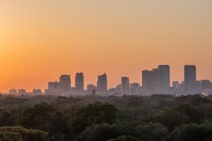 a view of a city skyline at sunset at Element Tampa Midtown in Tampa