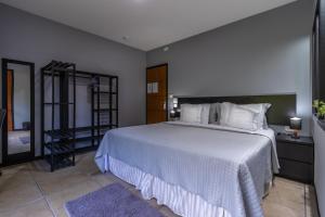 מיטה או מיטות בחדר ב-Kings International Hotel