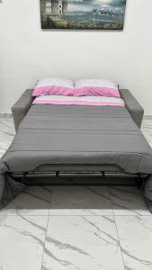 Postel nebo postele na pokoji v ubytování DG Sweet Home