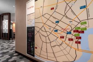 a map on a wall in a lobby at TownePlace Suites by Marriott New Orleans Downtown/Canal Street in New Orleans