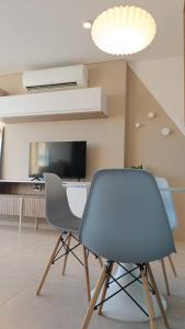 TV a/nebo společenská místnost v ubytování Monoambiente ACACIAS I